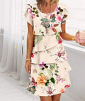 Layered dress with floral print and short sleeves