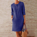 Shirt dress with long sleeves, button-up front, and pockets