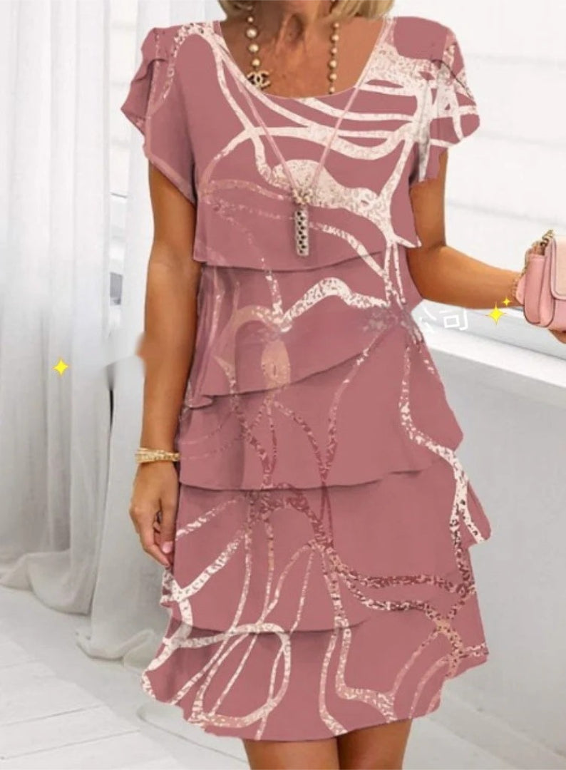 Layered dress with floral print and short sleeves
