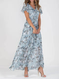 Maxi dress with floral print, V-neckline, and ruffled sleeves