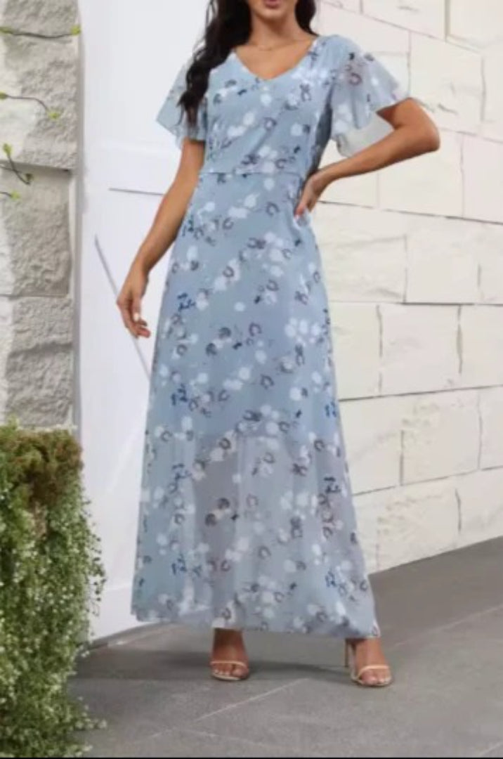 Maxi dress with floral print, V-neckline, and ruffled sleeves