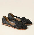Woven leather sandals with a closed toe