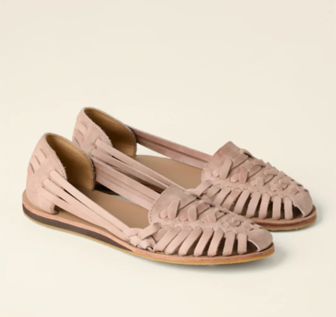 Woven leather sandals with a closed toe