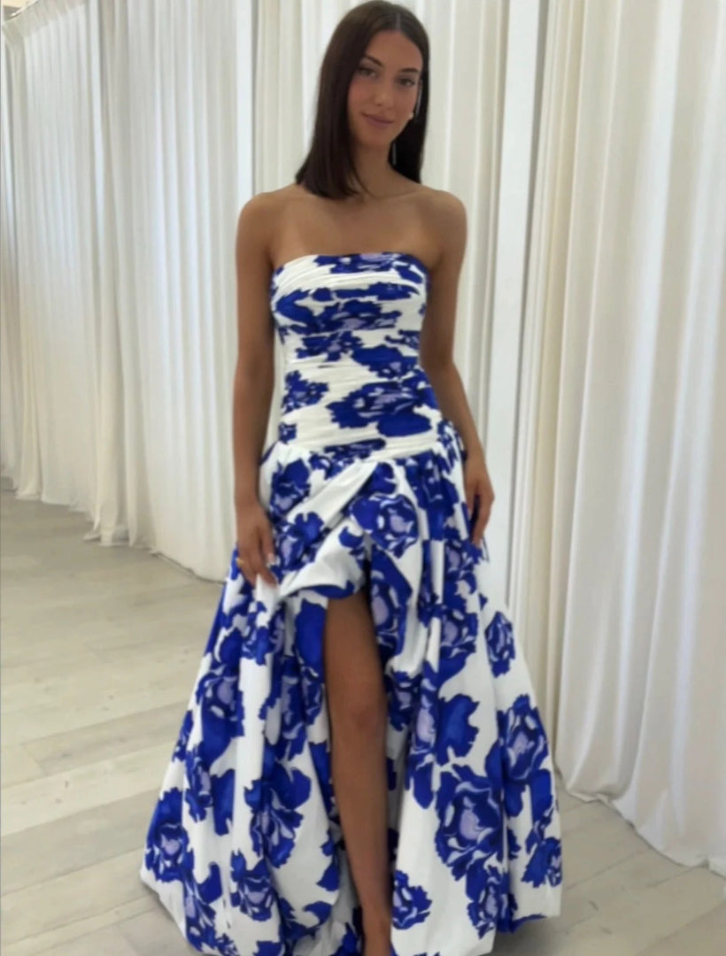 Strapless maxi dress with draping and floral high-low pattern