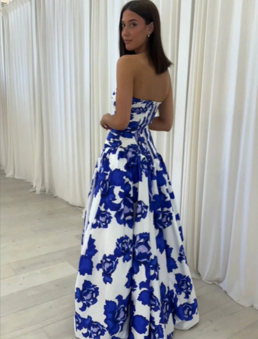 Strapless maxi dress with draping and floral high-low pattern