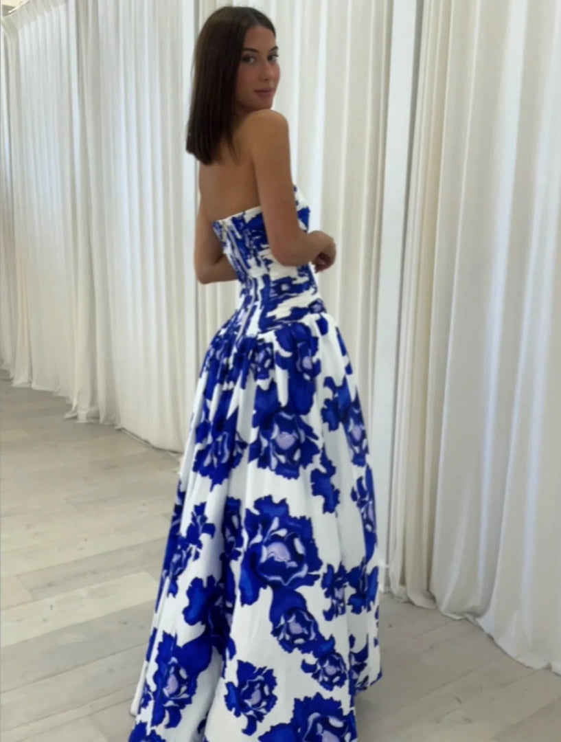 Strapless maxi dress with draping and floral high-low pattern