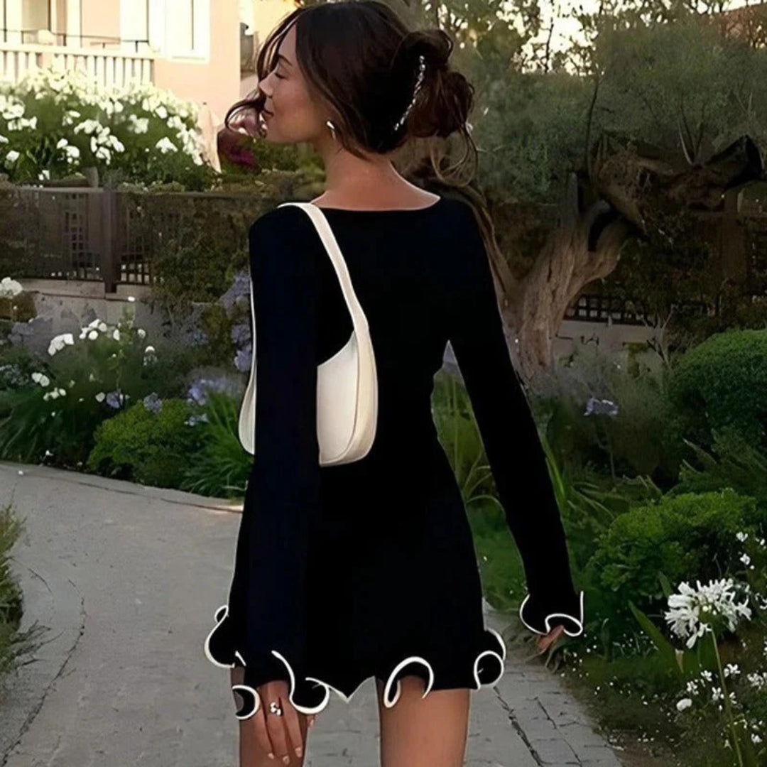 Mini dress with ruffle and contrast trim