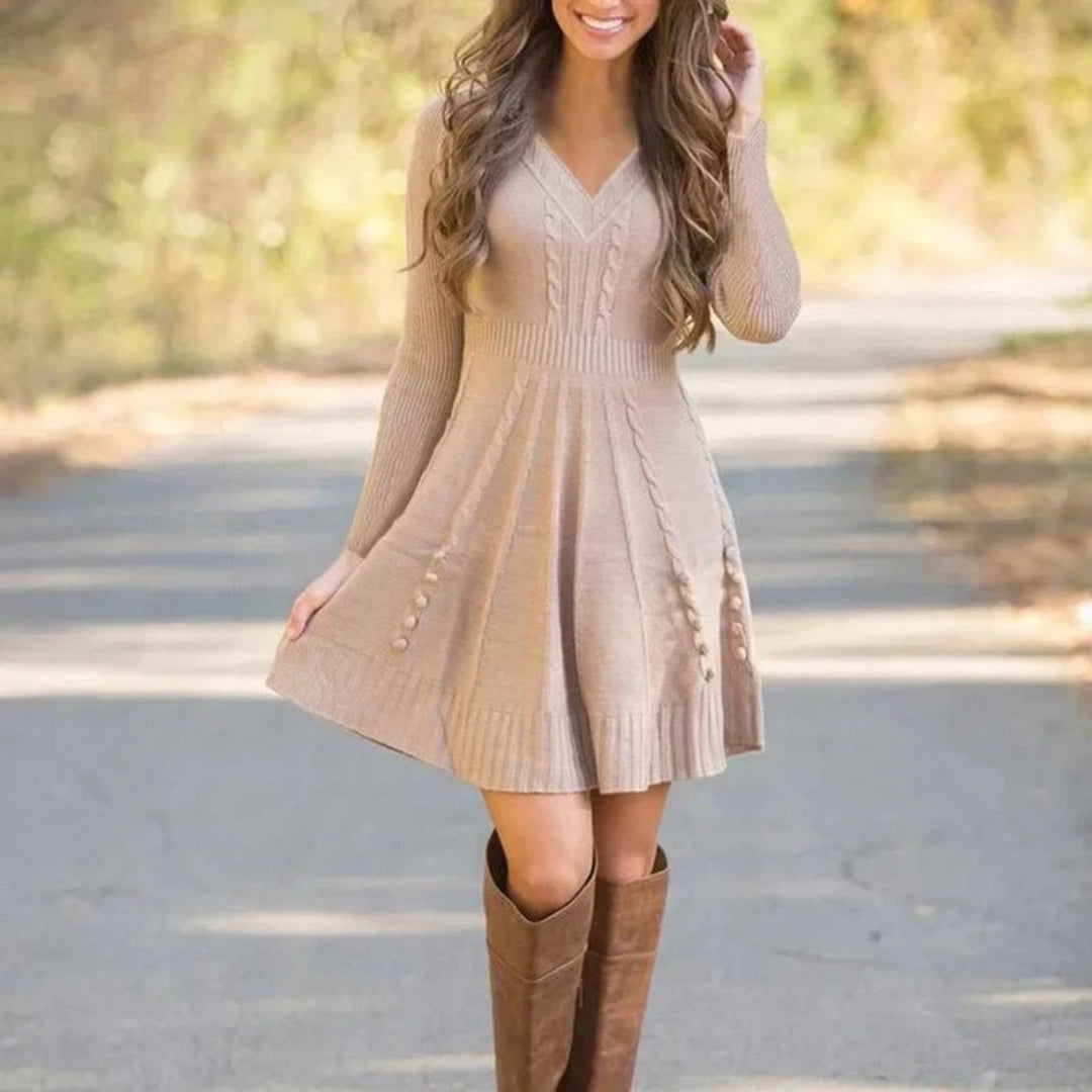 Sweater dress with a V-neck, cable knit pattern, and flared cut