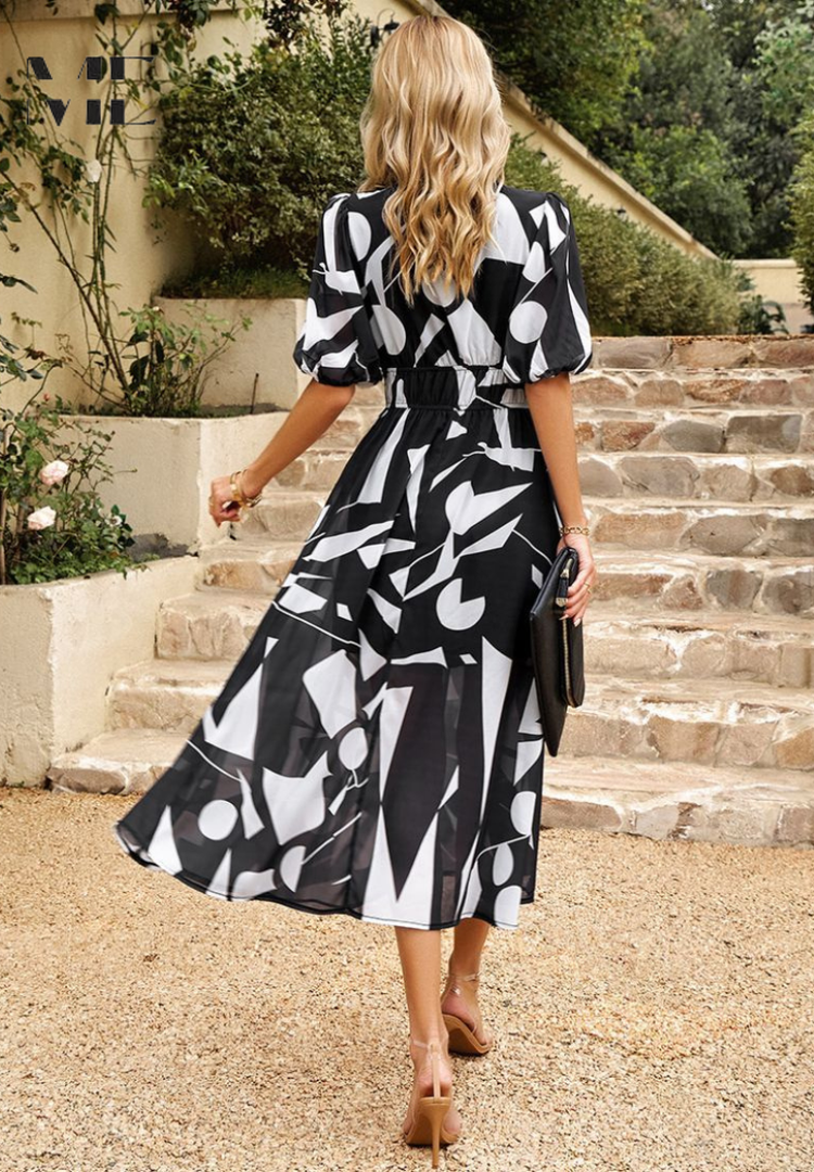 Floral midi dress with V-neckline and puff sleeves