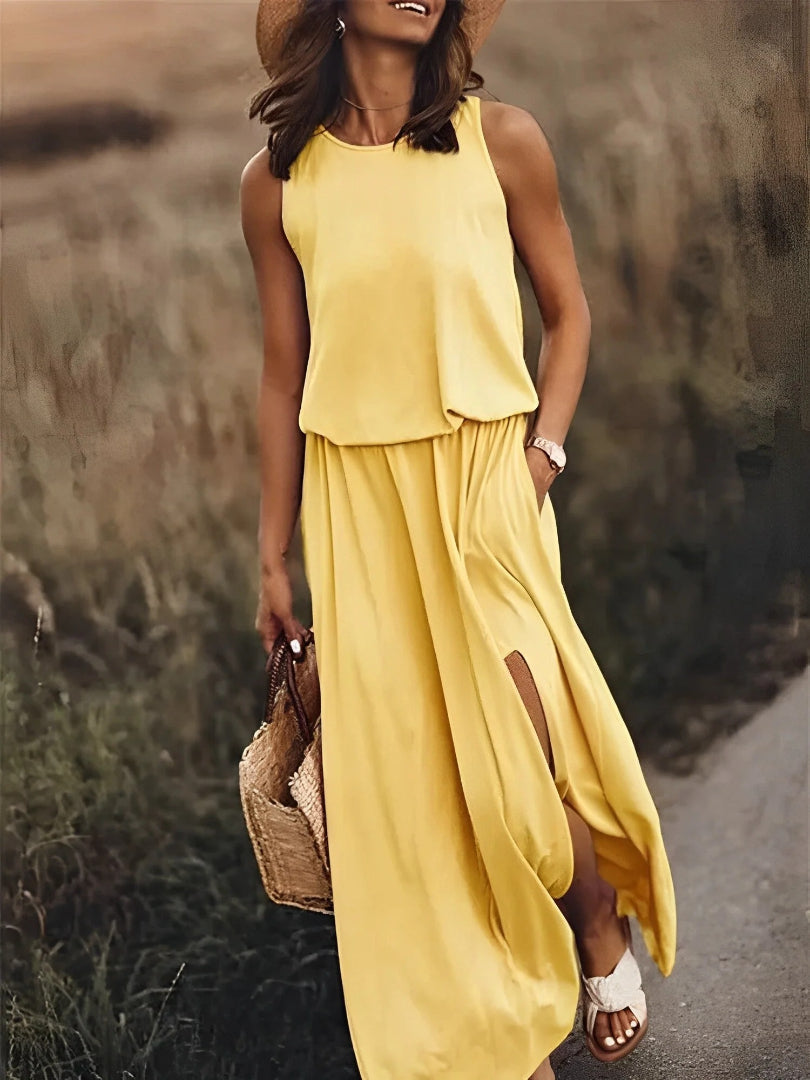 Sleeveless maxi dress with side slit and round neckline
