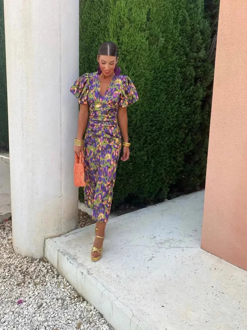 Midi dress with print, puff sleeves, and V-neckline
