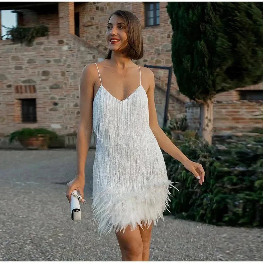 Mini sequin dress with fringe on spaghetti straps