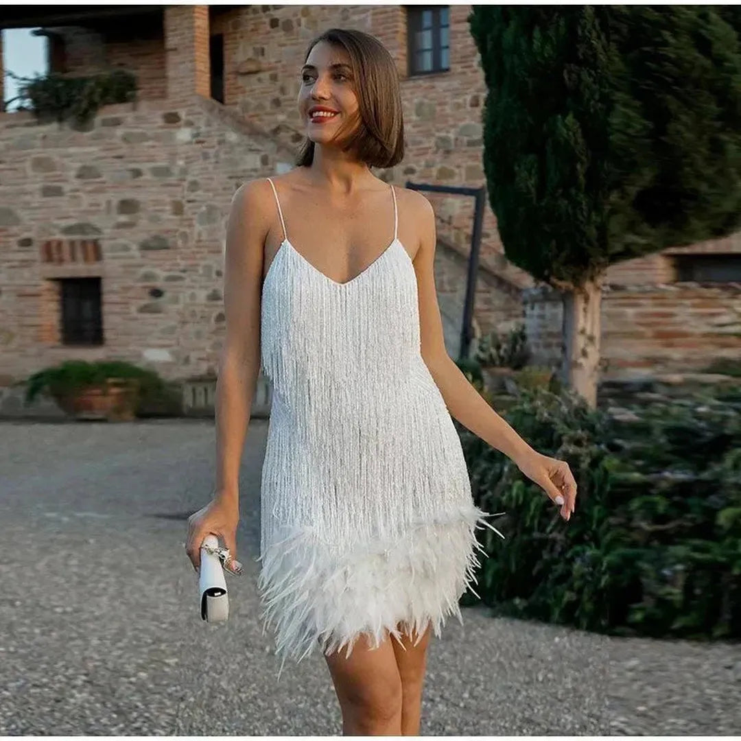 Mini sequin dress with fringe on spaghetti straps